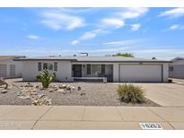 Charming single-story home with desert landscaping, neutral paint, and attached one-car garage at 6263 E Duncan St, Mesa, AZ 85205