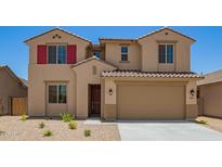 Two-story home featuring a tile roof, neutral stucco, and a two-car garage at 18365 W Villa Hermosa Ln, Surprise, AZ 85387