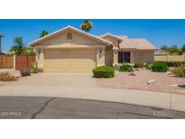 Charming single story home with a well-maintained front yard featuring desert landscaping at 2409 S Chestnut Pl, Chandler, AZ 85286