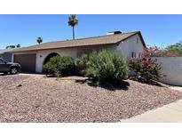 Charming single story home, complete with desert landscaping and mature trees at 2719 W Carter Dr, Tempe, AZ 85282