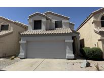 Charming two-story home featuring a tile roof and an attached two-car garage at 3428 E Renee Dr, Phoenix, AZ 85050