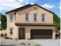 Stunning two-story home with a brown stucco finish and a two-car garage at 13282 E Verbina Ln, Florence, AZ 85132
