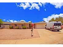 Charming single-story home with a well-maintained front yard and inviting curb appeal at 3450 W Kaler Dr, Phoenix, AZ 85051
