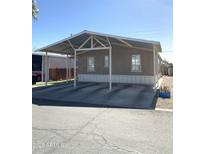 Charming single-story home featuring a carport and easy access in a well-maintained community at 501 E Ray Rd # 230, Chandler, AZ 85225