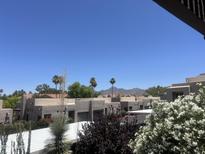 Charming condos with well-maintained landscaping and views of palm trees and mountains at 11260 N 92Nd St # 2102, Scottsdale, AZ 85260