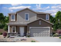 Charming two-story home with a two car garage, neutral color palette and beautifully landscaped front yard at 5828 W Coplen Farms Rd, Laveen, AZ 85339