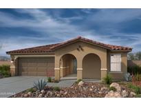 Inviting single-story home featuring a charming covered entry and a two-car garage, set against a beautiful cloudy sky at 21114 E Arrowhead Trl, Queen Creek, AZ 85142