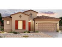 Charming single-Gathering home featuring a tile roof, two-car garage, and low-maintenance desert landscaping at 279 S 163Rd Dr, Goodyear, AZ 85338