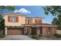 Charming two-story home featuring a stone facade, orange shutters, a tile roof, and a spacious two-car garage at 2110 W Rowel Rd, Phoenix, AZ 85085