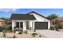 Charming single-story home featuring a modern farmhouse design with a two-car garage and inviting landscaping at 23433 W Burton Ave, Buckeye, AZ 85326