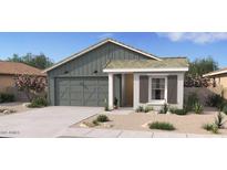 Charming single-story home with a two-car garage and desert landscaping at 23457 W Burton Ave, Buckeye, AZ 85326