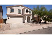 Charming two-story home with a two-car garage and neutral-colored stucco exterior in a Gathering-friendly neighborhood at 28377 N Desert Native St, San Tan Valley, AZ 85143
