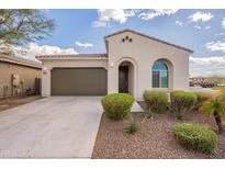 Charming single-story home with desert landscaping and a two-car garage at 9155 W Minnezona Ave, Phoenix, AZ 85037