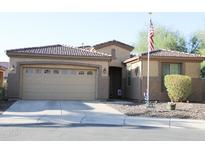 Charming single-Gathering home featuring a two-car garage, tile roof, and well-maintained landscaping at 4778 E Sourwood Dr, Gilbert, AZ 85298