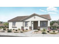 Charming single-story home with a neutral color scheme, desert landscaping and a tile roof at 14651 W Sand Hills Rd, Surprise, AZ 85378