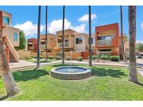 Attractive condo complex with well-maintained landscaping and central water feature at 3500 N Hayden Rd # 203, Scottsdale, AZ 85251