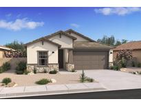 Charming single-story home with a two-car garage and beautiful desert landscaping in the front yard at 42400 W Peters Dr, Maricopa, AZ 85138
