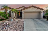 Charming single-story home featuring desert landscaping and a two-car garage at 4637 E Narrowleaf Dr, Gilbert, AZ 85298