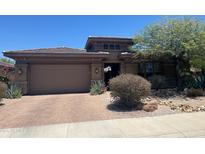 Charming single-Gathering home with a two-car garage, brick driveway, and drought-tolerant landscaping at 18008 W Ocotillo Ave, Goodyear, AZ 85338
