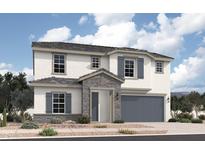 Inviting two-story home featuring gray accents, a covered porch, and an attached two-car garage at 18824 N Barano Dr, Maricopa, AZ 85138