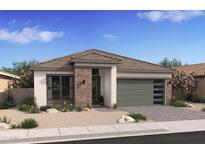 Beautiful single-story home featuring stone accents, a modern garage door, and professionally landscaped front yard at 490 E Aurora Dr, San Tan Valley, AZ 85140
