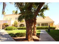 A charming restaurant with lush greenery in the front on a sunny day at 12221 W Bell Rd # 363, Surprise, AZ 85378