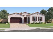 Charming single-story home featuring a two-car garage, neutral color palette, and well-maintained landscaping at 23244 W Tamarisk Ave, Buckeye, AZ 85326