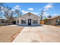Charming single-story home with a spacious driveway and welcoming front entrance at 538 S Macdonald --, Mesa, AZ 85210