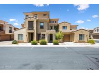 Inviting multi-level townhome featuring a private entry and attached garage at 1367 S Country Club Dr # 1221, Mesa, AZ 85210