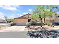 Charming single-story home featuring a well-maintained front yard with desert landscaping and a two car garage at 4167 E Hallihan Dr, Cave Creek, AZ 85331