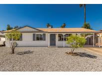 Charming single-story home featuring desert landscaping and a covered front entrance at 4526 W Mission Ln, Glendale, AZ 85302