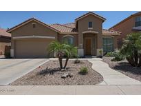 Charming single-Gathering home featuring a well-manicured front yard and inviting curb appeal at 10465 E Knowles Ave, Mesa, AZ 85209