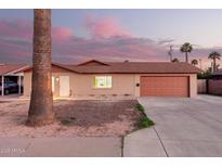 Charming single-story home with a two-car garage and a well-maintained front yard, perfect for suburban living at 3513 W Maryland Ave, Phoenix, AZ 85019