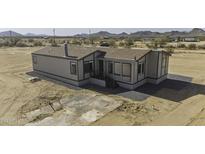 Charming single-story home featuring a covered porch and desert landscape at 53925 W Stallion Rd, Maricopa, AZ 85139