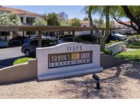 Welcome to Frank's on Shea Condominiums with covered parking and mature trees surrounding the property at 11375 E Sahuaro Dr # 1055, Scottsdale, AZ 85259