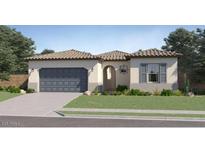 Charming single-story home with tile roof, lush green lawn, and two-car garage at 14949 W Cottontail Ln, Surprise, AZ 85387