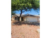 Charming single-Gathering home featuring a two-car garage and mature tree in the front yard at 3329 W Ross W Ave, Phoenix, AZ 85027
