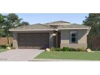 Charming single-story home featuring desert landscaping and a two-car garage at 36520 W Maddaloni Ave, Maricopa, AZ 85138