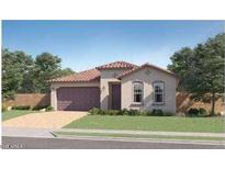 Charming single-story home featuring a tile roof, arched windows, manicured lawn, and a two-car garage at 4924 S 232Nd Ln, Buckeye, AZ 85326