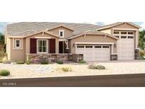 Charming single-story home featuring a three car garage and beautiful desert landscaping at 19560 E Estrella Rd, Queen Creek, AZ 85142