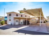 Charming single Gathering home with covered parking and a cozy front patio area at 17200 W Bell Rd # 1801, Surprise, AZ 85374
