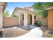 Inviting front exterior showcasing a charming porch and desert landscaping for low-maintenance appeal at 2715 N 73Rd Dr, Phoenix, AZ 85035