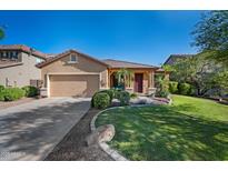 Charming single-story home featuring a well-manicured lawn and a welcoming front porch at 3147 E Vallejo Dr, Gilbert, AZ 85298