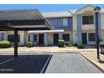 Inviting two-story townhouse with reserved parking and well-maintained landscaping at 7801 N 44Th Dr # 1036, Glendale, AZ 85301