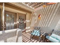 Charming patio area with seating and a pergola, creating a cozy outdoor space at 2333 E Southern Ave # 2016, Tempe, AZ 85282