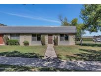Charming single-story home with well-maintained front yard and quaint entry way at 4752 N 20Th Ave, Phoenix, AZ 85015