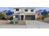 Charming two-story home with desert landscaping, stone accents, and an attached two-car garage at 24236 W Southgate Ave, Buckeye, AZ 85326