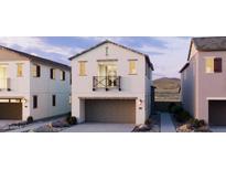 Charming two-story home features a balcony, a two-car garage, and neutral color palette at 2488 W Rowel Rd, Phoenix, AZ 85085