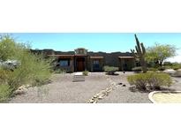 Charming home with beautiful desert landscaping and inviting curb appeal at 15523 W Peakview Rd, Surprise, AZ 85387