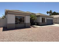 Charming single-story home with well-maintained landscape in a desirable neighborhood at 81 E Smoke Tree Rd, Gilbert, AZ 85296